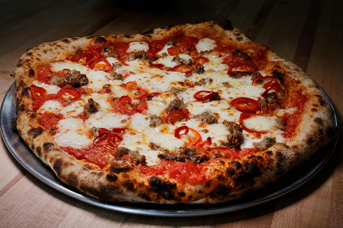 The Sausage + Peppers pizza at Pizzaioli in West Palm Beach. (Carline Jean/Sun Sentinel/TNS)