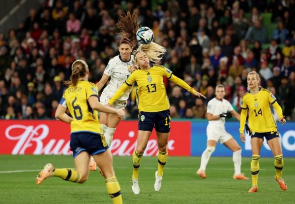 American Alex Morgan, native of Diamond Bar, Calif., wins a header for a shot on goal against Sweden's Amanda Ilestedt during the Women’s World Cup soccer match between Sweden and the United States in Melbourne, Australia, on Aug. 6, 2023. (Asanka Brendon Ratnayake/Reuters)