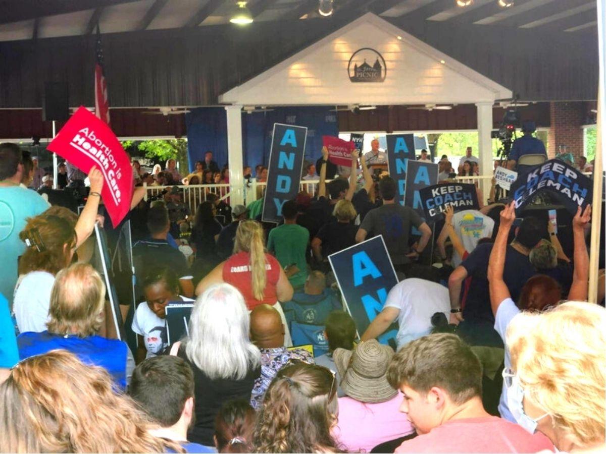 Kentucky U.S. Rep. James Comer (R) speaks at the Fancy Farm Picnic to jeers from supporters of Kentucky Democratic Gov. Andy Beshear. (Jeff Louderback/The Epoch Times)