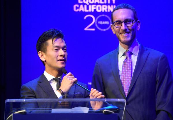 (L-R) California Assemblyman Evan Low and state Sen. Scott Wiener speak onstage during Equality California's Special 20th Anniversary Los Angeles Equality Awards in Los Angeles on Sept. 28, 2019. (Matt Winkelmeyer/Getty Images for Equality California)