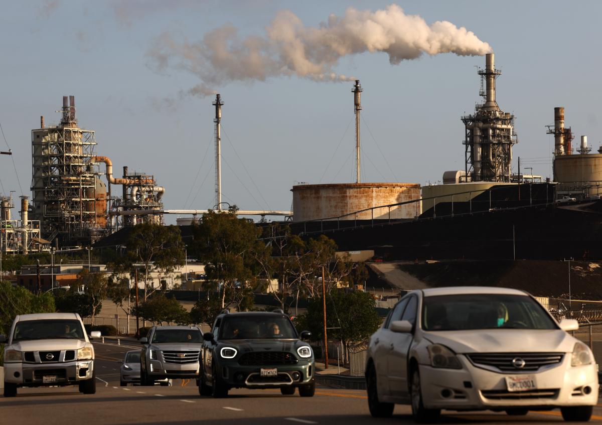 Vehicles pass the Phillips 66 Los Angeles Refinery Wilmington Plant in Wilmington, California, on Nov. 28, 2022. (Mario Tama/Getty Images)