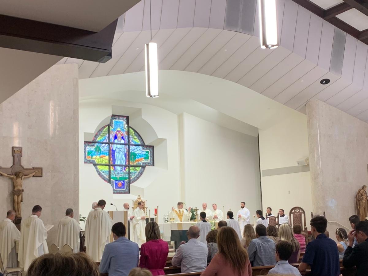 Priests and parishioners celebrate mass at Christ the King Catholic Church in Tampa, Fla., on Aug. 16, 2020. (T.J. Muscaro/The Epoch Times)