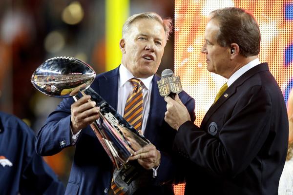 Denver Broncos General Manager John Elway celebrates with the Vince Lombardi Trophy after winning Super Bowl 50 at Levi's Stadium in Santa Clara, Calif., on Feb. 7, 2016. The Denver Broncos defeated the Carolina Panthers 24-10. (Streeter Lecka/Getty Images)