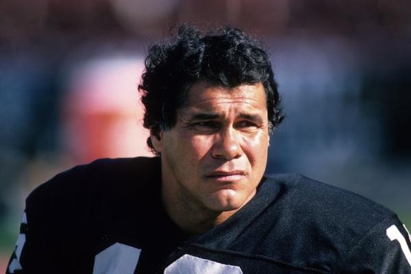 Quarterback Jim Plunkett (16) of the Los Angeles Raiders takes a break from the action during the game against the San Diego Chargers at the Los Angeles Memorial Coliseum on Sept. 28, 1986. The Raiders won 17-13. (George Rose/Getty Images)