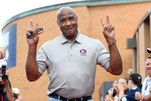 Hall of Fame wide receiver Lynn Swann poses for photos as he is introduced prior to the 2022 Pro Football Hall of Fame Enshrinement Ceremony at Tom Benson Hall of Fame Stadium in Canton, Ohio, on Aug. 06, 2022. (Nick Cammett/Getty Images)