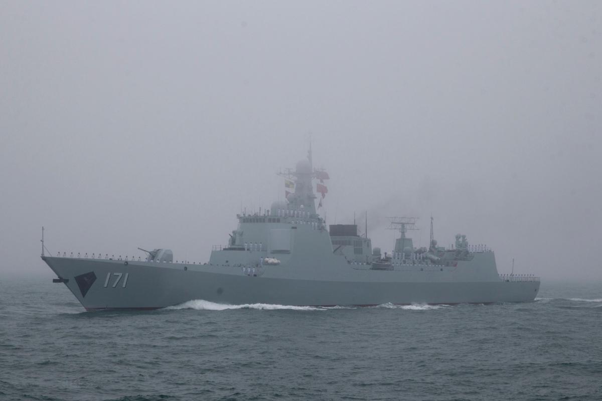 The type 052C destroyer Haikou of the Chinese People's Liberation Army (PLA) Navy participates in a naval parade to commemorate the 70th anniversary of the founding of China's PLA Navy in the sea near Qingdao, in China's Shandong Province, on April 23, 2019. (Mark Schiefelbein/AFP via Getty Images)