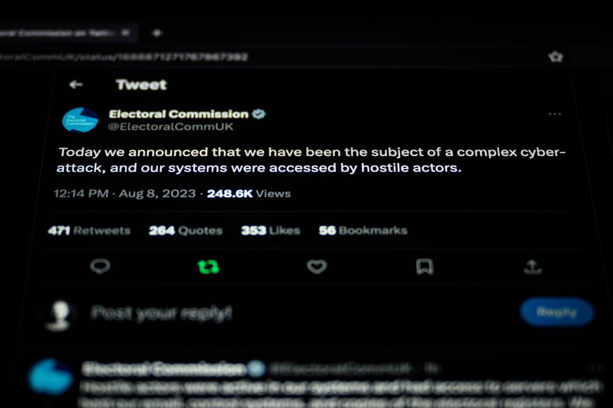 A tweet from the Electoral Commission is displayed on a computer screen in London on Aug. 8, 2023. (Leon Neal/Getty Images)