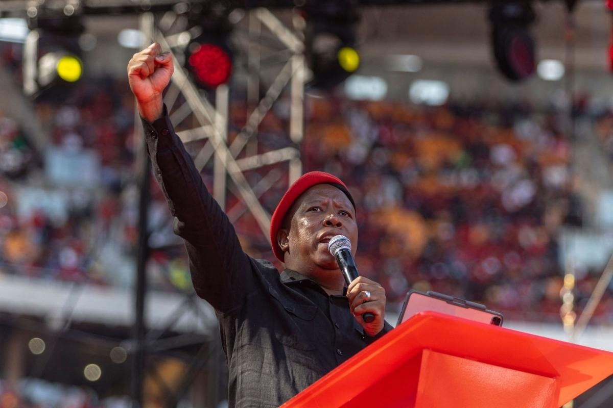 Economic Freedom Fighters (EFF) leader Julius Malema gestures from the stage as he celebrates the 10th anniversary of the party in Johannesburg on July 29, 2023. (Guillem Sartorio/AFP via Getty Images)