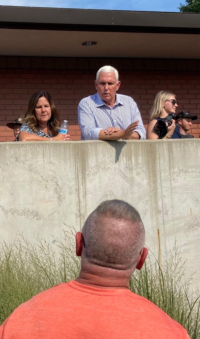Former Vice President Mike Pence and his wife, Karen Pence, spontaneously respond to questions from the midway after the 2024 GOP presidential candidate's speech on Aug. 10, 2023, during the first day of the Iowa State Fair. (John Haughey/The Epoch Times)