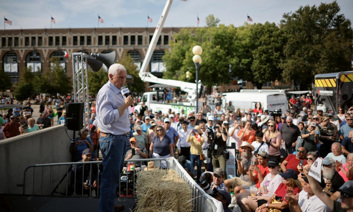 Republican presidential candidate former Vice President Mike Pence tells fairgoers why he should be the next president from the Des Moines Register's SoapBox at the Iowa State Fair in Des Moines, Iowa, on Aug. 10, 2023. (Chip Somodevilla/Getty Images)