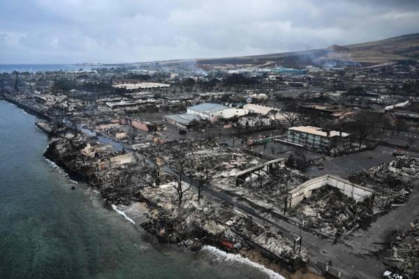 An aerial image shows destroyed homes and buildings on the waterfront burned to the ground in Lahaina in the aftermath of wildfires in western Maui, Hawaii on Aug. 10, 2023. (Patrick Fallon/AFP via Getty Images)