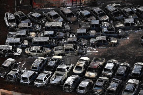 An aerial image shows destroyed cars in Lahaina in the aftermath of wildfires in western Maui, Hawaii, on Aug. 10, 2023. (Patrick Fallon/AFP via Getty Images)