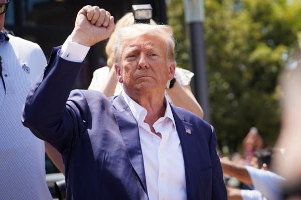 Former President Donald Trump leaves at the Iowa State Fair in Des Moines, Iowa, on Aug. 12, 2023. (Madalina Vasiliu/The Epoch Times)