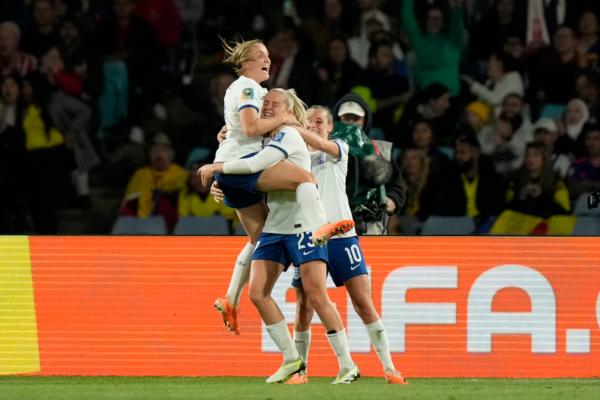 England's Alessia Russo, center, celebrates after scoring her side's 2nd goal during the Women's World Cup quarterfinal soccer match between England and Colombia at Stadium Australia in Sydney, Australia, on Aug. 12, 2023. (AP Photo/Rick Rycroft)