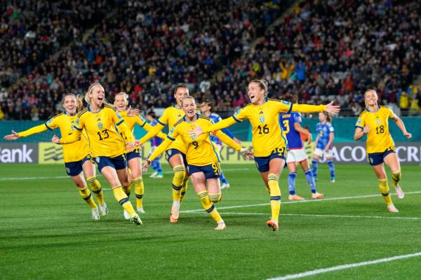 Sweden's Filippa Angeldal, second right, celebrates after scoring her side's second goal off a penalty kick during the Women's World Cup quarterfinal soccer match between Japan and Sweden at Eden Park in Auckland, New Zealand, Friday, Aug. 11, 2023. (AP Photo/Abbie Parr)