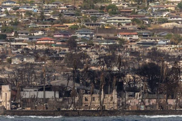 Destroyed buildings and homes are seen from a boat in the aftermath of a wildfire in Lahaina, western Maui, Hawaii on Aug. 12, 2023. (Yuki Iwamura/AFP via Getty Images)