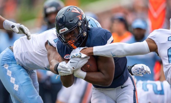 Virginia Player Wounded in Deadly Attack Returns for a New Season as an Inspiration to His Teammates