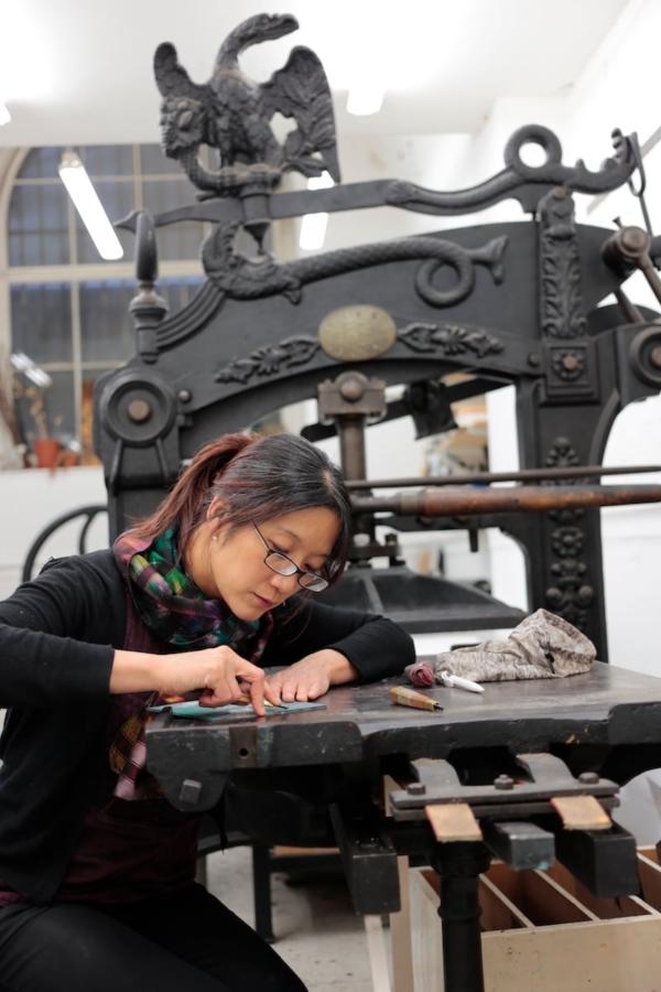 Ms. HO is highly passionate about printmaking which she thinks can help her record her daily life. (Courtesy of Hong Kong Open Printshop)