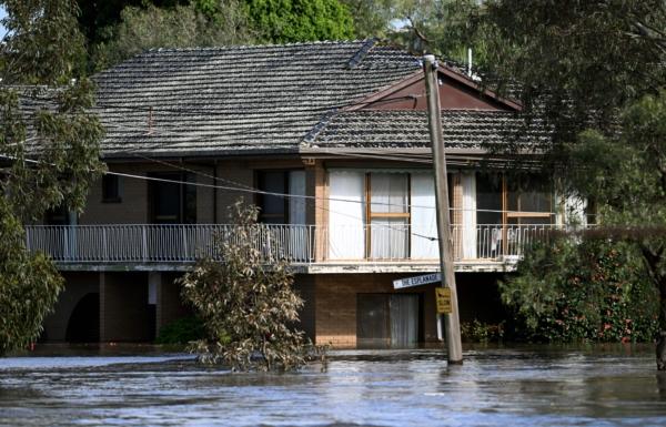 A house is inundated by water during flooding in Melbourne, Australia, on Oct. 14, 2022. (William West/AFP via Getty Images)