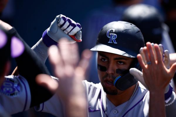 Alan Trejo (13) of the Colorado Rockies celebrates a two-run home run against the Los Angeles Dodgers in the fourth inning at Dodger Stadium in Los Angeles on August 13, 2023. (Ronald Martinez/Getty Images)