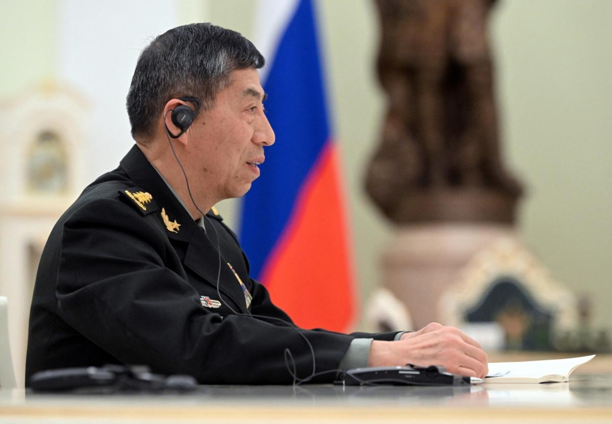  Chinese Defence Minister Li Shangfu attends a meeting with Russian President Vladimir Putin and Defense Minister Sergei Shoigu in Moscow on April 16, 2023. (Sputnik/Pavel Bednyakov/Pool via Reuters)