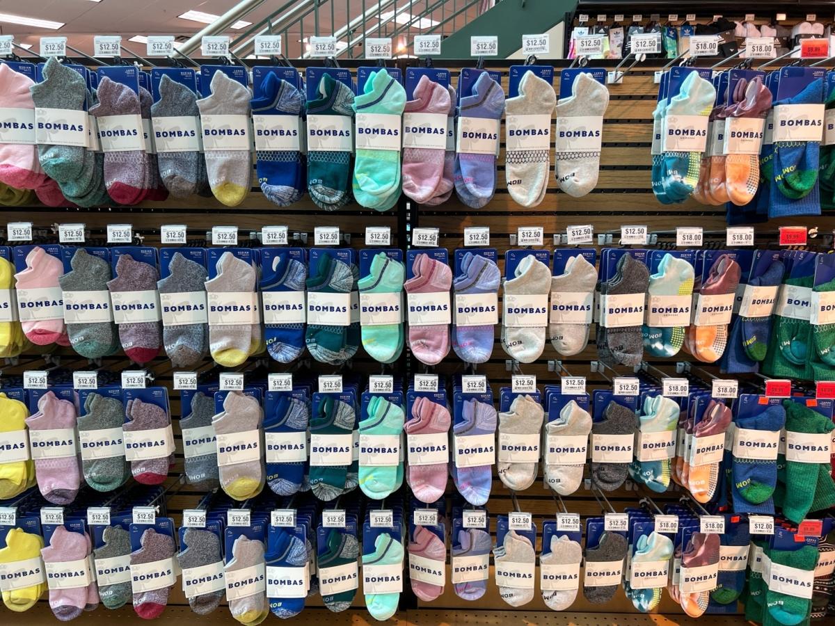 A display of Bombas socks for sale at the Scheels Sporting Goods store in Springfield, Illinois, on May 2, 2022. (Joni Hanebutt/Shutterstock)