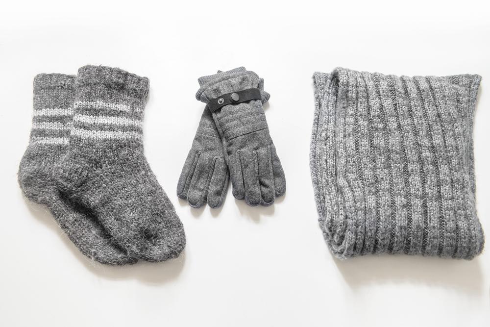 Wool socks and mittens are good stockpile items in case of sudden snow or ice storms and power outages. (Nick Starichenko/Shutterstock)