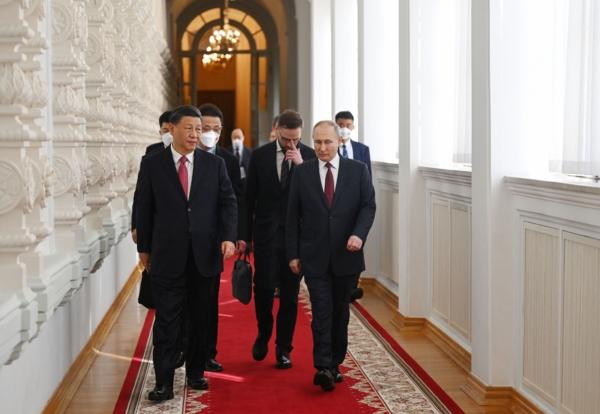 Russian President Vladimir Putin meets with China's leader Xi Jinping at the Kremlin in Moscow on March 21, 2023. (Grigory Sysoyev / Sputnik / AFP via Getty Images)