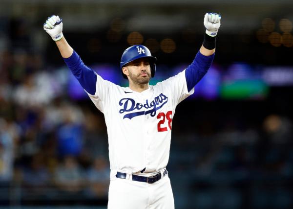 J.D. Martinez (28) of the Los Angeles Dodgers after driving in a run on a double against the Milwaukee Brewersin the sixth inning at Dodger Stadium in Los Angeles on August 15, 2023. (Ronald Martinez/Getty Images)