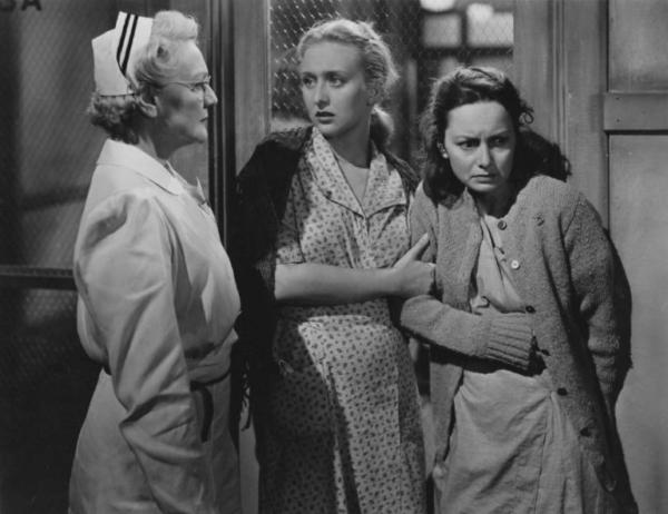 (L–R) Nurse Davis (Helen Craig), Grace (Celeste Holm), and Virginia (Olivia de Havilland), in “The Snake Pit.” (20th Century Fox)