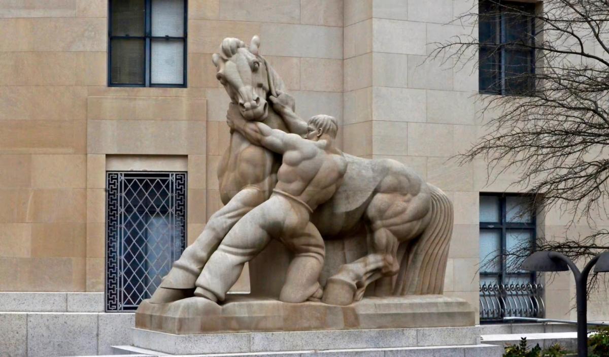 The historical landmark "Man controlling trade" monument statue in Washington, D.C., on April 3, 2016. (Jake Suppe/Shutterstock)