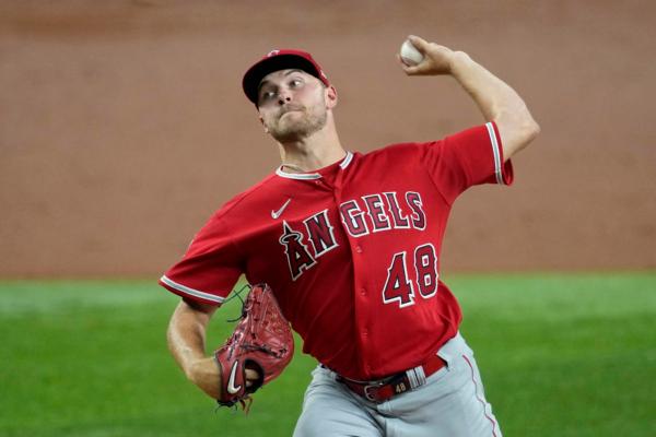 Los Angeles Angels starting pitcher Reid Detmers throws to a Texas Rangers batter during the third inning of a baseball game in Arlington, Texas, on Aug. 16, 2023. (Tony Gutierrez/AP Photo)