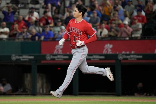 Shohei Ohtani (17) of the Los Angeles Angels runs the bases after hitting a solo home run during the first inning against the Texas Rangers at Globe Life Field in Arlington, Texas, on August 16, 2023. (Sam Hodde/Getty Images)