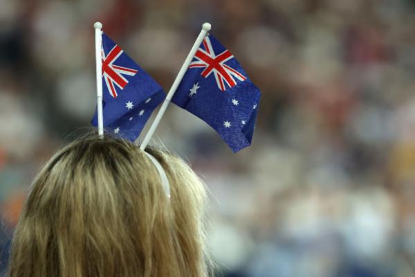 A spectator wears Australian flags during the fourth round singles match between Novak Djokovic of Serbia and Alex de Minaur of Australia during day eight of the 2023 Australian Open at Melbourne Park in Melbourne, Australia on Jan. 23, 2023. (Mark Kolbe/Getty Images)