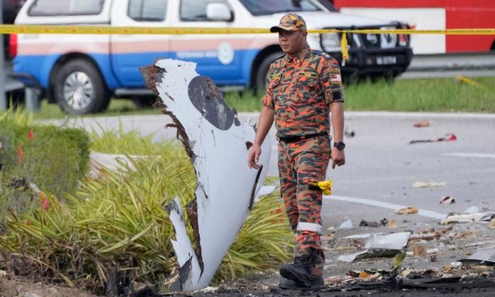 Small Plane Crashes on a Malaysian Highway, Killing All 8 People on Board and 2 on the Ground