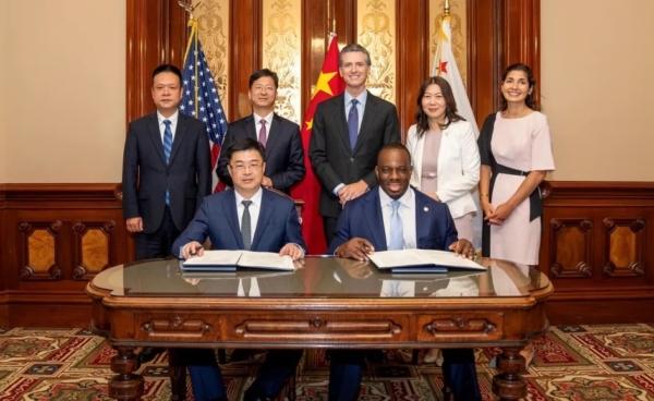 Delegates from California and China's Hainan Province sign an international climate agreement in Sacramento, Calif., on Aug. 3, 2023. (Courtesy of Office of Governor Gavin Newsom)