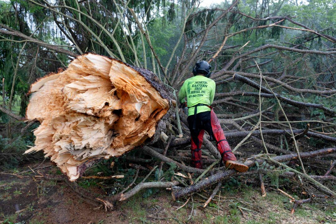 Rhode Island Tornado Lifts Car as New England Storms Flood Roads, Topple Trees