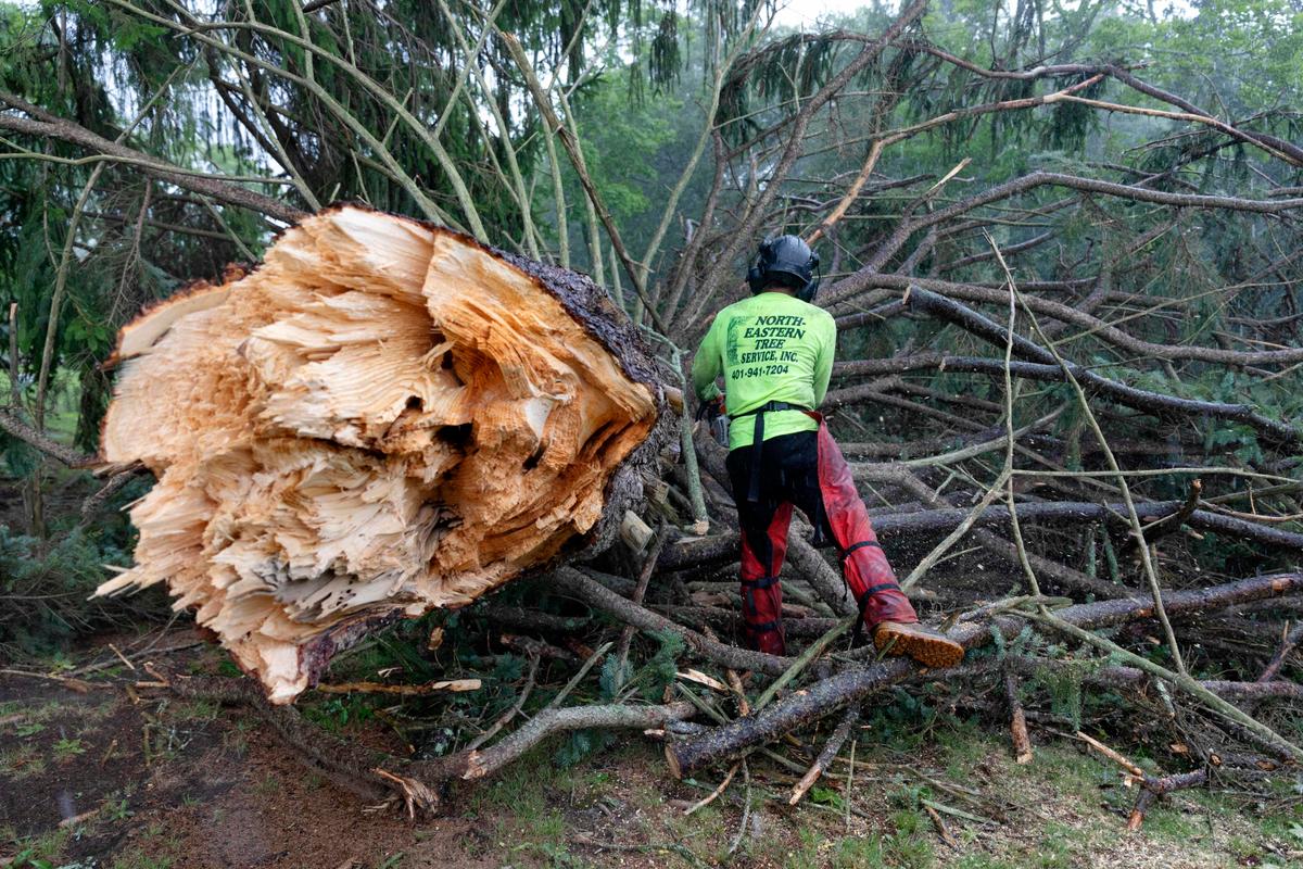 Rhode Island Tornado Lifts Car as New England Storms Flood Roads, Topple Trees