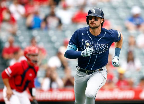 Josh Lowe (15) of the Tampa Bay Rays hits a two-run single against the Los Angeles Angels during game one of a doubleheader at Angel Stadium of Anaheim in Anaheim, Calif., on August 19, 2023. (Ronald Martinez/Getty Images)