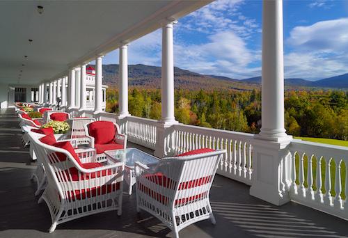 The storied veranda where guests can enjoy meals and cocktails and take in the direct views of Mount Washington, the highest mountain in New England.(Courtesy of Omni Mount Washington Resort)