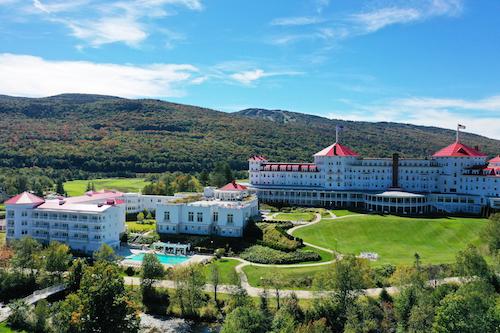 A view of the pool, the hotel and the Bretton Woods Ski Area in the background.(Courtesy of Omni Mount Washington Resort)