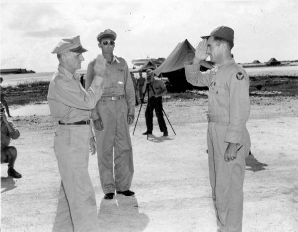 Gen. Carl Spaatz decorates Tibbets (R) with the Distinguished Service Cross after the Hiroshima mission. (Public Domain)