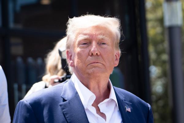 Former President Donald Trump leaves the Iowa State Fair in Des Moines, Iowa, on Aug. 12, 2023. (Madalina Vasiliu/The Epoch Times)