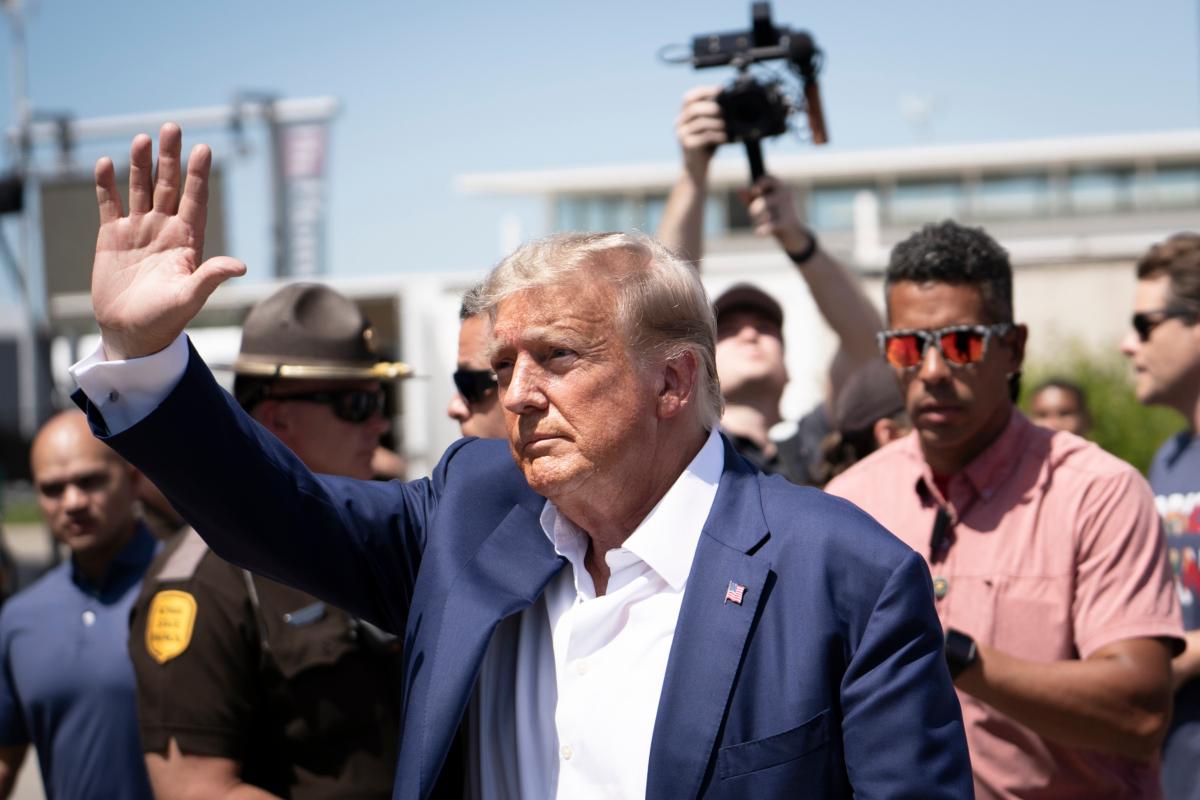 Former President Donald Trump leaves the Iowa State Fair in Des Moines, Iowa, on Aug. 12, 2023. (Madalina Vasiliu/The Epoch Times)