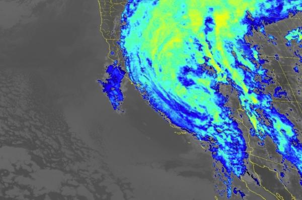 Visible and infrared imaging of clouds forming around Tropical Storm Hilary by NOAA's GOES geostationary satellite around 8 p.m. on Aug. 20, 2023. (NOAA/Screenshot via The Epoch Times)