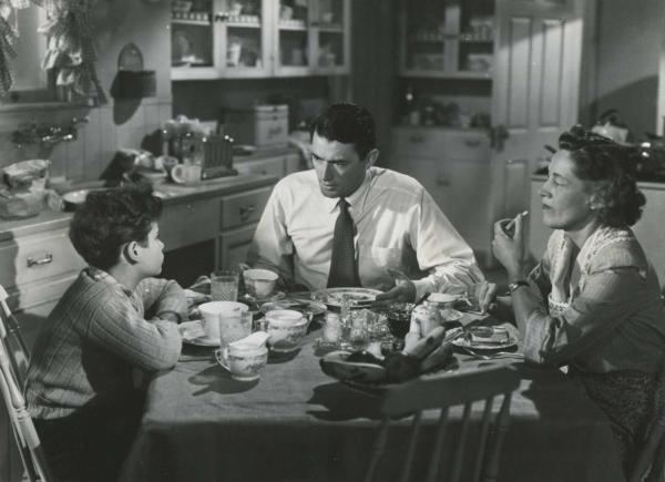 (L–R) Tommy Green (Dean Stockwell), Philip Schuyler Green (Gregory Peck), and Mrs. Green (Anne Revere), in “Gentleman’s Agreement.” (20th Century Fox)