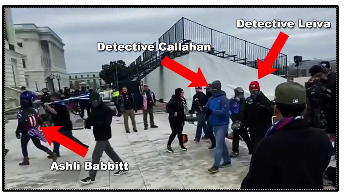 MPD detectives Michael Callahan and Ricardo Leiva walked up the northwest steps of the U.S. Capitol just behind Ashli Babbitt. (U.S. District Court/Screenshot via The Epoch Times)