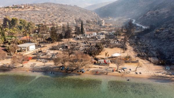 The campsite of village of Saranti following a wildfire, near Prodromos, 100km southwest of Athens, Greece, on Aug. 22, 2023. (Spyros Bakalis/AFP via Getty Images)