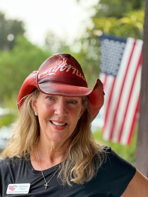 Deborah Pauly, president of Conservative Patriots of Orange County, organizes a private event for supporters of former Trump attorney John Eastman at a ranch in northern Orange County, Calif., on Aug. 19, 2023. (Brad Jones/The Epoch Times)