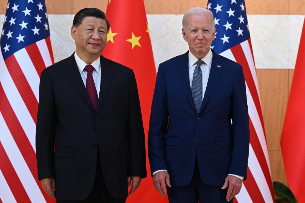 U.S. President Joe Biden (R) and Chinese leader Xi Jinping meet on the sidelines of the G20 summit in Nusa Dua on the Indonesian resort island of Bali on Nov. 14, 2022. (Saul Loeb/AFP via Getty Images)